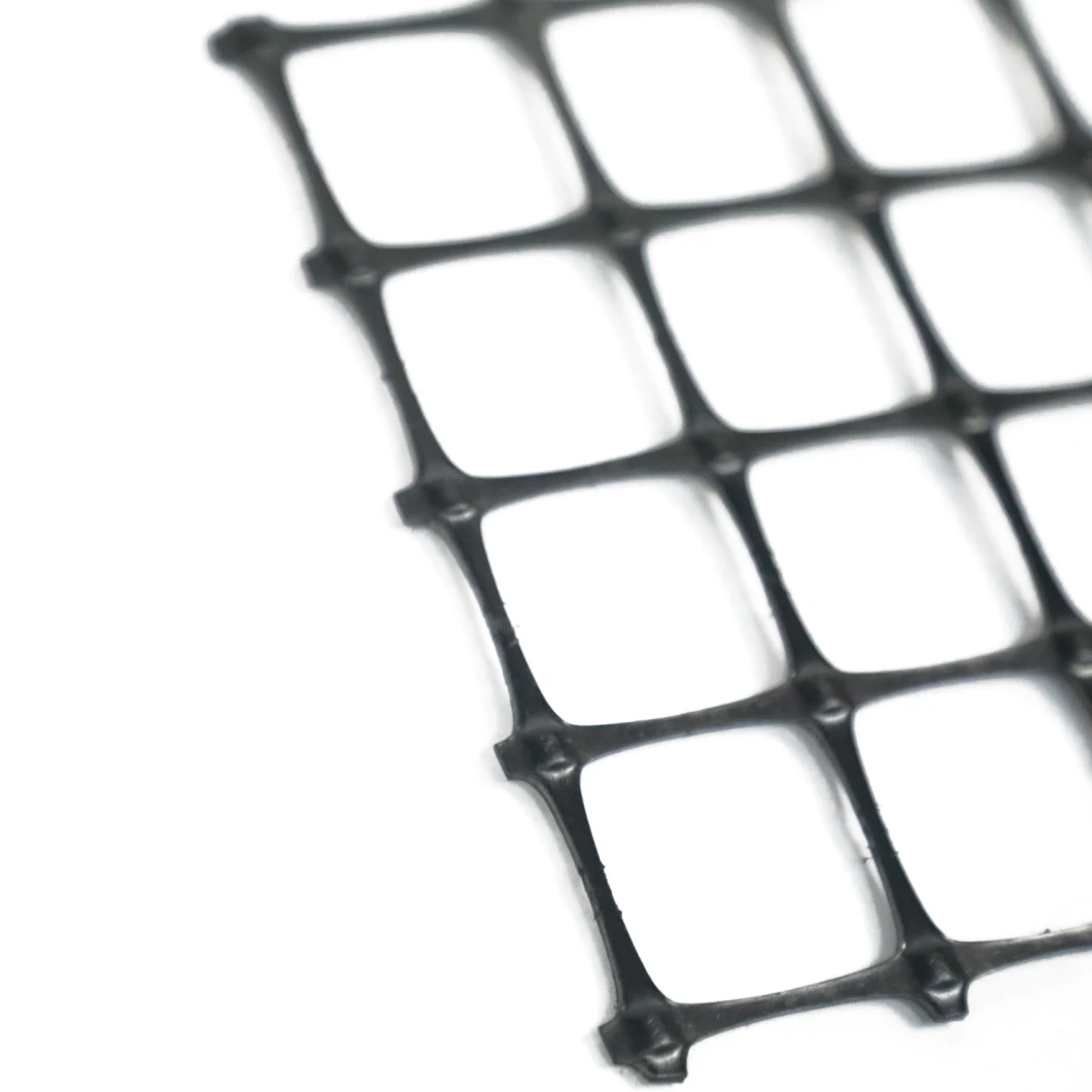 A inclinação do solo do ISO da fábrica mura a grade preta do cascalho de Geogrid 50-50kn do poliéster de grande resistência do reforço