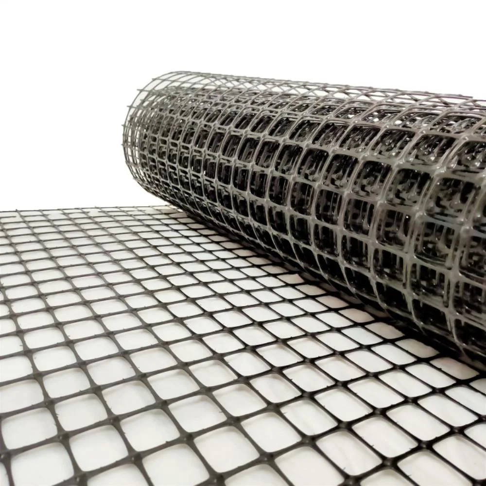 A inclinação do solo do ISO da fábrica mura a grade preta do cascalho de Geogrid 50-50kn do poliéster de grande resistência do reforço