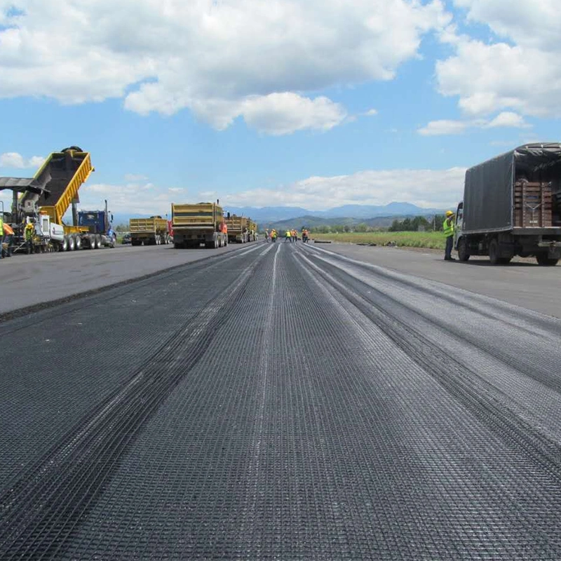 A inclinação do solo do ISO da fábrica mura a grade preta do cascalho de Geogrid 50-50kn do poliéster de grande resistência do reforço